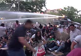 Police disperses sit-down protest in front of president