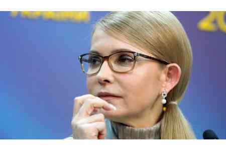 Тимошенко требует провести досрочные парламентские выборы в Украине