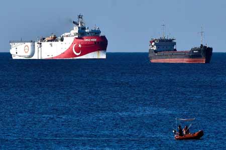 Greek frigate kicks Turkish vessel out of disputed Mediterranean  waters