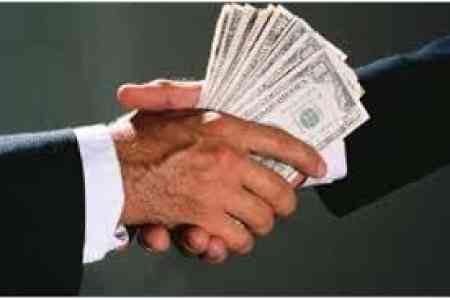 Social worker charged with bribery